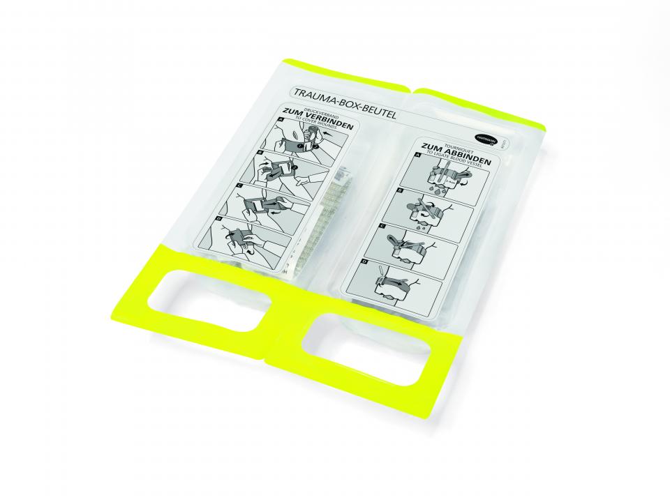 Der TRAUMA-BOX Beutel: in der linken Kammer Einweghandschuhe & TRAUMA BANDAGE,...